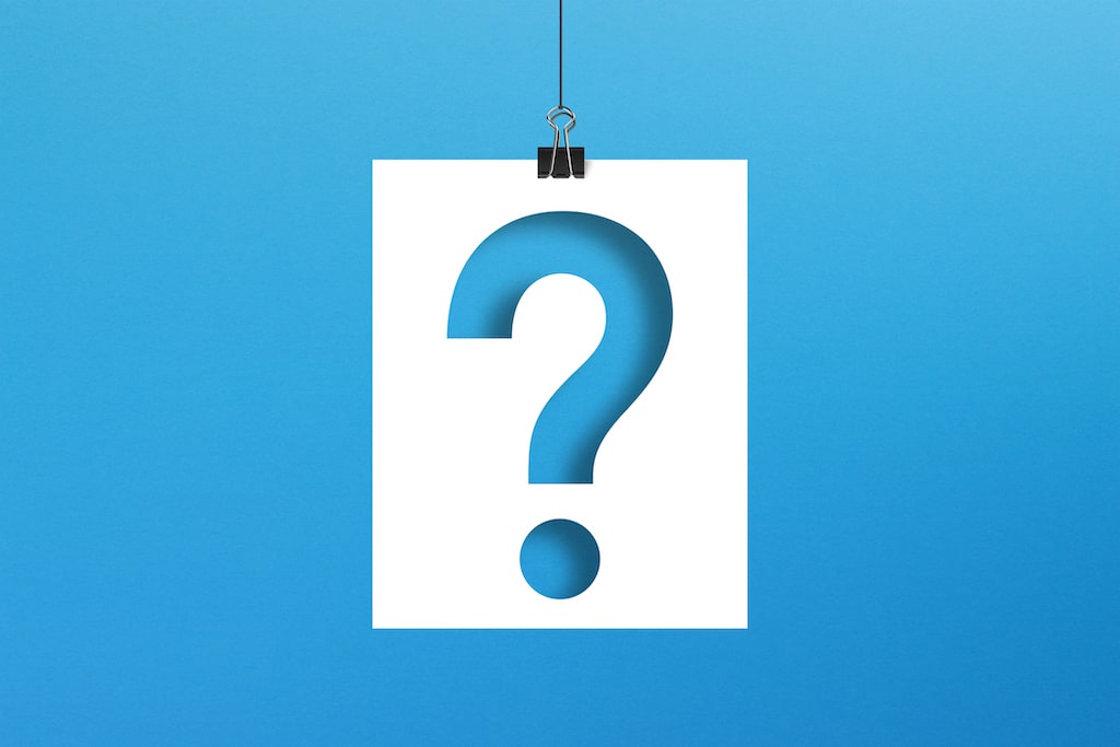Question mark on paper hanging with clip on blue background. Gas Leak and Detection Repair