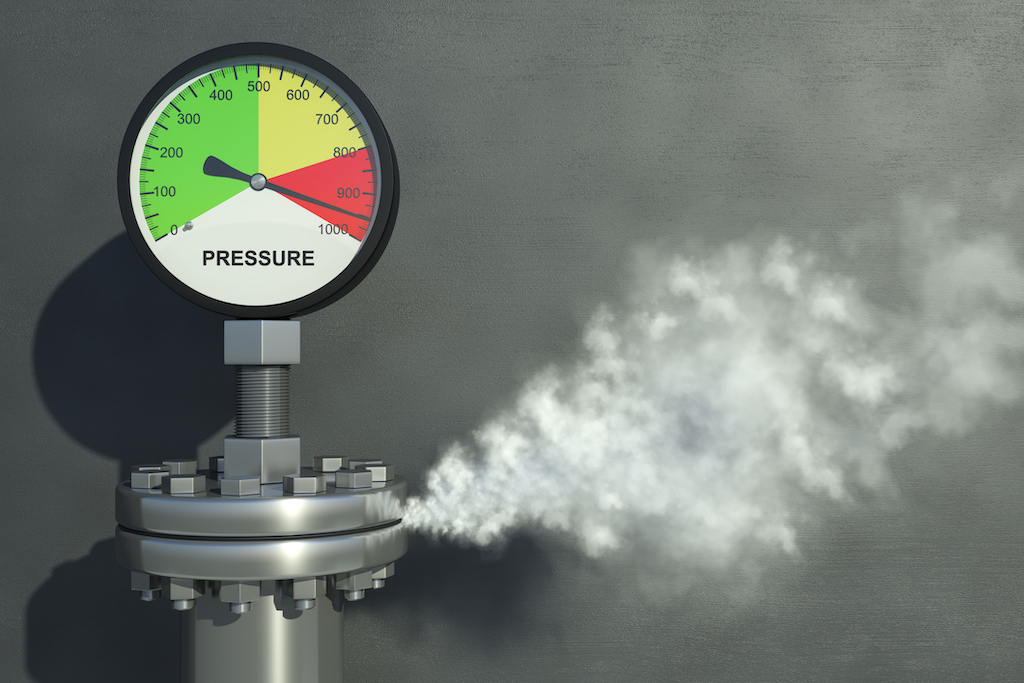 Gas or steam leaking from an industrial pressure gauge. Gas Leak and Detection Repair