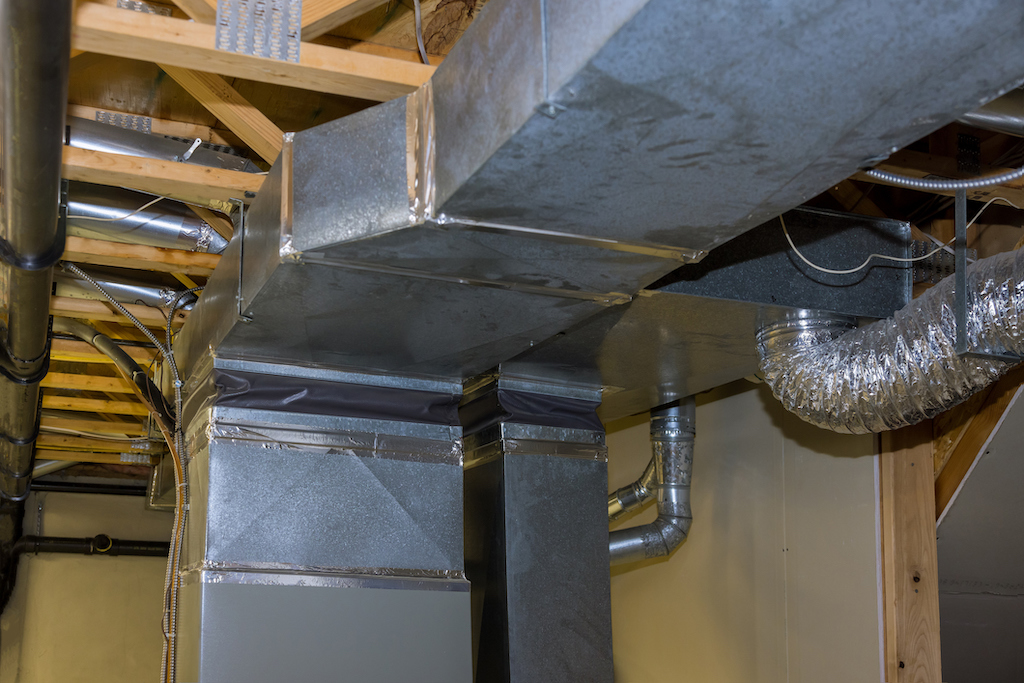 Air ventilation system in steel central heating tubes pipes on new home. Duct System