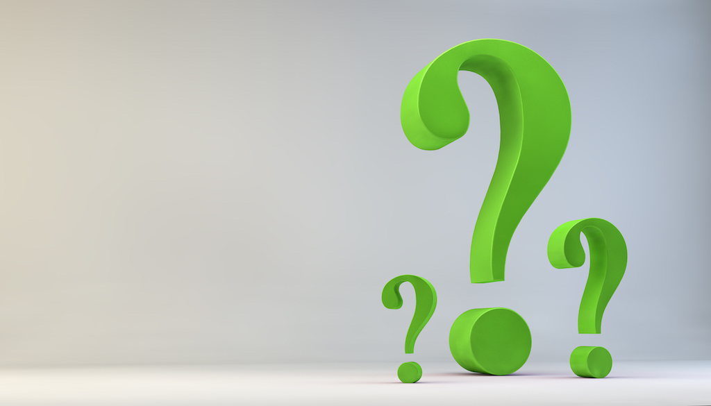 Lime green question marks on plain background. Representing FAQs about plumbing service.
