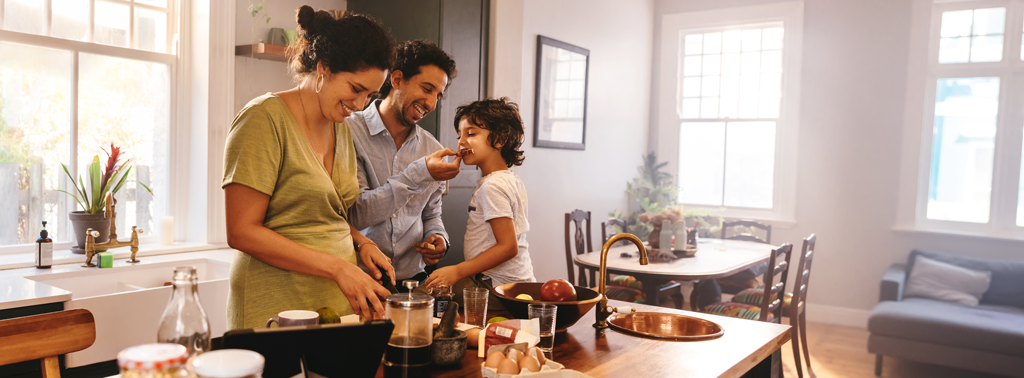 Happy family cooking in the kitchen | Plumbing Service in Jesuit Bend, LA