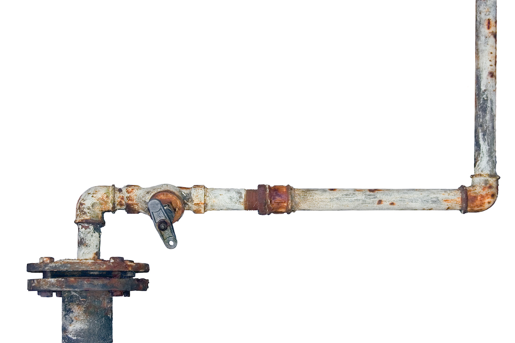 Pipe corrosion. Old rusty pipe on white background. | Plumbing service