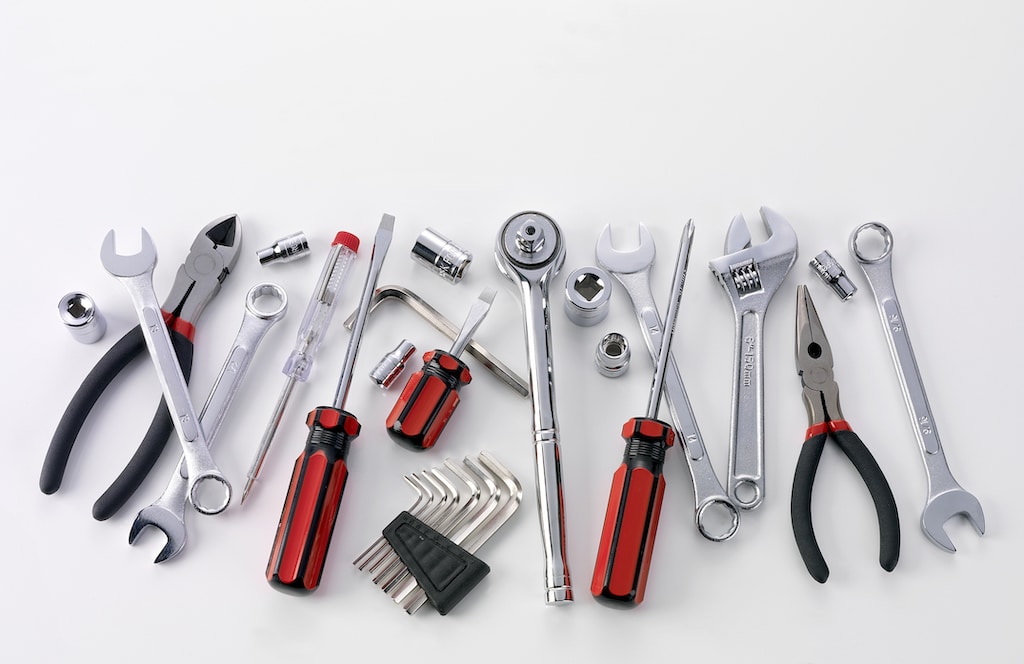 Plumbing tools on white background. | plumbing service