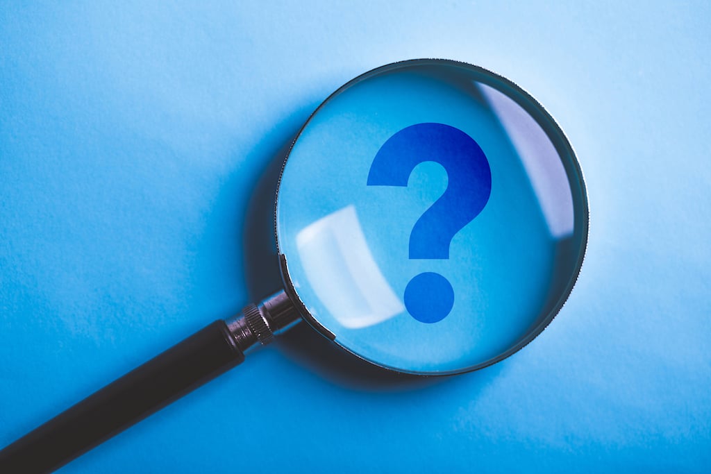 Blue question mark with magnifying glass on top. | Madisonville's Premier Plumbing Services